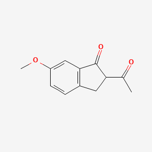 molecular formula C12H12O3 B13312455 2-Acetyl-6-methoxy-2,3-dihydro-1H-inden-1-one 