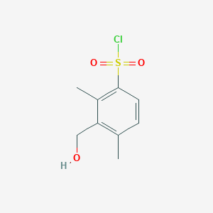 molecular formula C9H11ClO3S B13312483 3-(Hydroxymethyl)-2,4-dimethylbenzene-1-sulfonyl chloride 