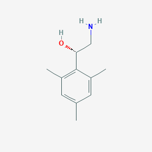 (1S)-2-amino-1-(2,4,6-trimethylphenyl)ethan-1-ol