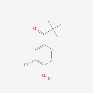 molecular formula C11H13ClO2 B13312599 1-(3-Chloro-4-hydroxyphenyl)-2,2-dimethylpropan-1-one 