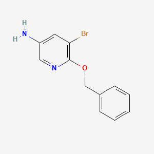 molecular formula C12H11BrN2O B13312874 6-(Benzyloxy)-5-bromopyridin-3-amine 