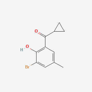 2-Bromo-6-cyclopropanecarbonyl-4-methylphenol