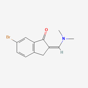 molecular formula C12H12BrNO B13313614 6-Bromo-2-[(dimethylamino)methylidene]-2,3-dihydro-1H-inden-1-one 