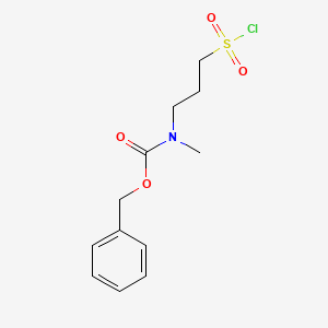 molecular formula C12H16ClNO4S B13314352 BenzylN-[3-(chlorosulfonyl)propyl]-N-methylcarbamate 