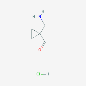 molecular formula C6H12ClNO B13314472 1-[1-(Aminomethyl)cyclopropyl]ethan-1-one hydrochloride CAS No. 1955561-26-8