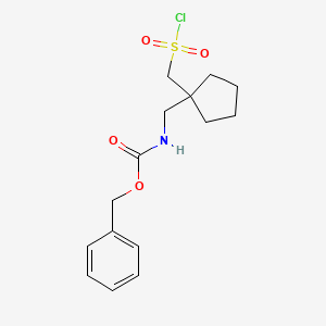 molecular formula C15H20ClNO4S B13315779 Benzyl N-({1-[(chlorosulfonyl)methyl]cyclopentyl}methyl)carbamate 