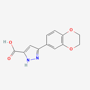 molecular formula C12H10N2O4 B1331657 5-(2,3-二氢-苯并[1,4]二氧杂环-6-基)-2H-吡唑-3-羧酸 CAS No. 299936-54-2