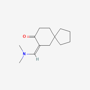 molecular formula C13H21NO B13317863 7-[(Dimethylamino)methylidene]spiro[4.5]decan-8-one 