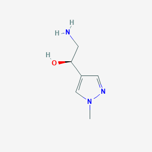 molecular formula C6H11N3O B13318050 (1R)-2-Amino-1-(1-methyl-1H-pyrazol-4-yl)ethan-1-ol 