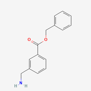 molecular formula C15H15NO2 B13318254 Benzyl 3-(aminomethyl)benzoate 