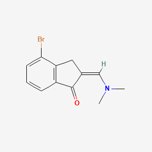 molecular formula C12H12BrNO B13318558 4-Bromo-2-[(dimethylamino)methylidene]-2,3-dihydro-1H-inden-1-one 