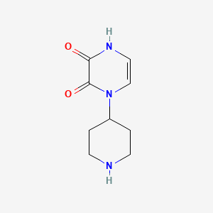 molecular formula C9H13N3O2 B13322553 1-(Piperidin-4-yl)-1,2,3,4-tetrahydropyrazine-2,3-dione 