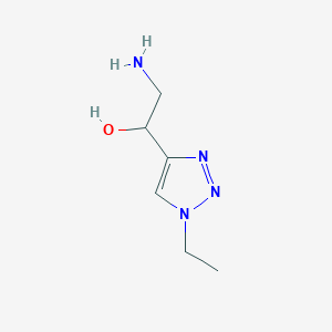 molecular formula C6H12N4O B13325847 2-Amino-1-(1-ethyl-1H-1,2,3-triazol-4-yl)ethan-1-ol 