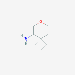 molecular formula C8H15NO B13328810 7-Oxaspiro[3.5]nonan-5-amine 