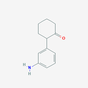 2-(3-Aminophenyl)cyclohexan-1-one