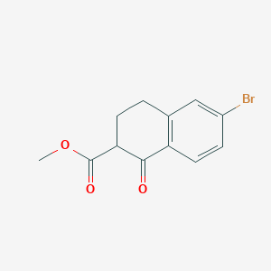 molecular formula C12H11BrO3 B13333610 Methyl 6-bromo-1-oxo-1,2,3,4-tetrahydronaphthalene-2-carboxylate 