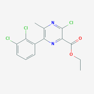 molecular formula C14H11Cl3N2O2 B13335709 Ethyl 3-chloro-6-(2,3-dichlorophenyl)-5-methylpyrazine-2-carboxylate 