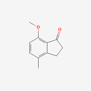 B1338295 7-Methoxy-4-methyl-2,3-dihydro-1H-inden-1-one CAS No. 67901-83-1