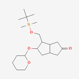 molecular formula C20H36O4Si B13390324 4-[[tert-butyl(dimethyl)silyl]oxymethyl]-5-(oxan-2-yloxy)-3,3a,4,5,6,6a-hexahydro-1H-pentalen-2-one 