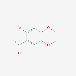 molecular formula C9H7BrO3 B1339878 7-溴-2,3-二氢-1,4-苯二氧杂环-6-甲醛 CAS No. 99067-25-1