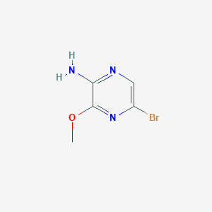 molecular formula C5H6BrN3O B134139 5-溴-3-甲氧基吡嗪-2-胺 CAS No. 5900-13-0