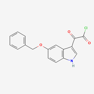 molecular formula C17H12ClNO3 B13427606 alpha-Oxo-5-(phenylmethoxy)-1H-indole-3-acetyl Chloride 