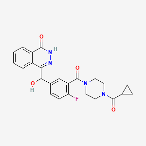 molecular formula C24H23FN4O4 B13437156 4-((3-(4-(Cyclopropanecarbonyl)piperazine-1-carbonyl)-4-fluorophenyl)(hydroxy)methyl)phthalazin-1(2H)-one CAS No. 1460272-53-0