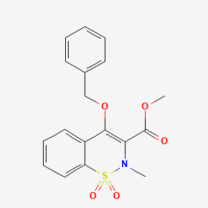 molecular formula C18H17NO5S B13447965 2-Methyl-4-(phenylmethoxy)-2H-1,2-benzothiazine-3-carboxylic Acid Methyl Ester, 1,1-Dioxide 