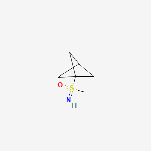 molecular formula C6H11NOS B13451711 {Bicyclo[1.1.1]pentan-1-yl}(imino)methyl-lambda6-sulfanone 