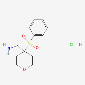 molecular formula C12H18ClNO3S B13464381 1-[4-(Benzenesulfonyl)oxan-4-yl]methanamine hydrochloride 