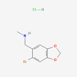 molecular formula C9H11BrClNO2 B13464628 [(6-Bromo-1,3-dioxaindan-5-yl)methyl](methyl)amine hydrochloride CAS No. 2866322-71-4