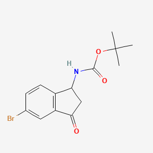 Tert-butyl (5-bromo-3-oxo-2,3-dihydro-1H-inden-1-YL)carbamate