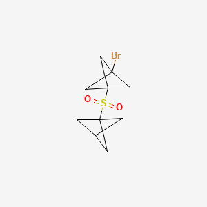 molecular formula C10H13BrO2S B13468206 1-{Bicyclo[1.1.1]pentane-1-sulfonyl}-3-bromobicyclo[1.1.1]pentane 