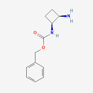 molecular formula C12H16N2O2 B13473593 rac-benzyl N-[(1R,2S)-2-aminocyclobutyl]carbamate 