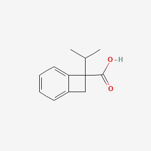 7-(Propan-2-yl)bicyclo[4.2.0]octa-1,3,5-triene-7-carboxylic acid