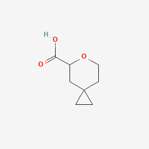 molecular formula C8H12O3 B13476297 6-Oxaspiro[2.5]octane-5-carboxylic acid CAS No. 2383651-96-3