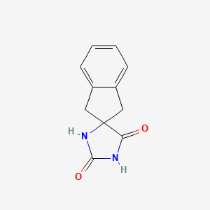 molecular formula C11H10N2O2 B1347638 1',3'-Dihydrospiro[imidazolidine-4,2'-indene]-2,5-dione CAS No. 27473-61-6