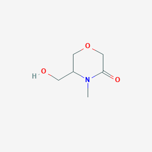 molecular formula C6H11NO3 B13476792 5-(Hydroxymethyl)-4-methylmorpholin-3-one 