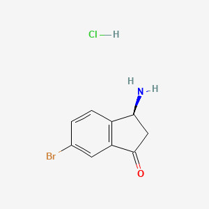 (3S)-3-amino-6-bromo-2,3-dihydro-1H-inden-1-one hydrochloride