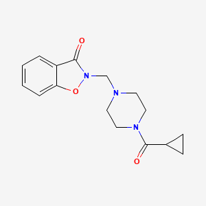 molecular formula C16H19N3O3 B13480200 2-[(4-Cyclopropanecarbonylpiperazin-1-yl)methyl]-2,3-dihydro-1,2-benzoxazol-3-one 