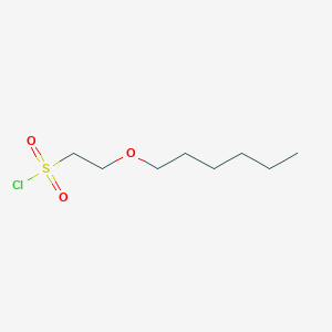 molecular formula C8H17ClO3S B13483359 2-(Hexyloxy)ethane-1-sulfonyl chloride 