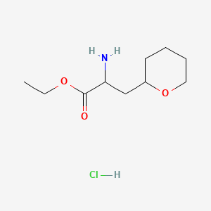 Ethyl 2-amino-3-(oxan-2-yl)propanoate hydrochloride