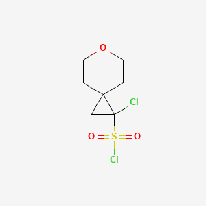 molecular formula C7H10Cl2O3S B13487404 1-Chloro-6-oxaspiro[2.5]octane-1-sulfonyl chloride 