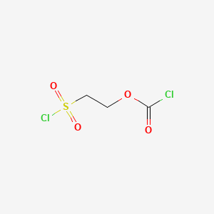 molecular formula C3H4Cl2O4S B13488510 2-[(Chlorocarbonyl)oxy]ethane-1-sulfonyl chloride 