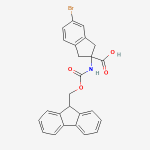 5-bromo-2-(9H-fluoren-9-ylmethoxycarbonylamino)-1,3-dihydroindene-2-carboxylic acid