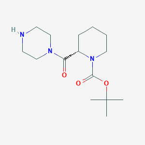 tert-butyl (2S)-2-(piperazine-1-carbonyl)piperidine-1-carboxylate