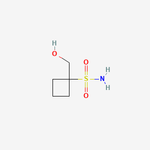 molecular formula C5H11NO3S B13493415 1-(Hydroxymethyl)cyclobutane-1-sulfonamide 