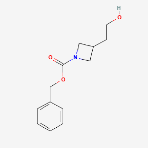 molecular formula C13H17NO3 B13494577 Benzyl 3-(2-hydroxyethyl)azetidine-1-carboxylate 