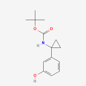 molecular formula C14H19NO3 B13499834 tert-butyl N-[1-(3-hydroxyphenyl)cyclopropyl]carbamate 