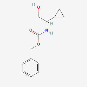 molecular formula C13H17NO3 B13500439 Benzyl (1-cyclopropyl-2-hydroxyethyl)carbamate 